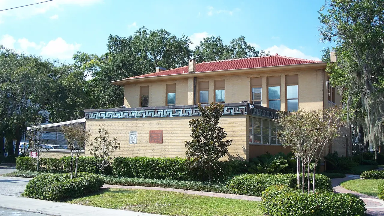 The historic Carnegie library building and its lawn in Bradenton